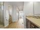 Hallway showing bathroom, bedroom, and shower at 7875 S Grand Baker St, Aurora, CO 80016