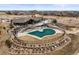 Aerial view of community pool and clubhouse with professional landscaping at 7875 S Grand Baker St, Aurora, CO 80016