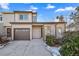 Charming two-story home featuring a private garage, well maintained landscaping, and a welcoming entrance at 273 E 4Th Ave, Longmont, CO 80504