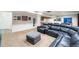 Open basement space with kitchen, dining, and entertainment areas for gatherings at 634 E 130Th Way, Thornton, CO 80241