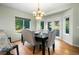 Stylish dining room featuring a chandelier, and large windows at 634 E 130Th Way, Thornton, CO 80241