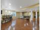 Basement bar with granite countertop, barstool seating, and pendant lighting, perfect for entertaining guests at 10371 Knollside Dr, Parker, CO 80134