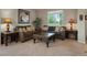 Comfortable living room with plush sofas, decorative pillows, and a stylish coffee table at 10371 Knollside Dr, Parker, CO 80134