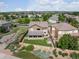 Aerial view of home featuring a backyard, patio, and professional landscaping at 10371 Knollside Dr, Parker, CO 80134