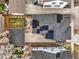 Overhead view of property showcasing solar panels, patio, yard, and detached garage at 2949 Emporia Ct, Denver, CO 80238