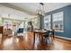 Inviting living room features a fireplace, hardwood floors, and plenty of natural light at 2949 Emporia Ct, Denver, CO 80238