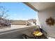 Cozy balcony with seating offers a relaxing outdoor space and neighborhood views at 5537 Lewis Ct # 101, Arvada, CO 80002