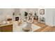 Spacious and bright living room showcasing a fireplace, modern furniture, stylish decor, and an open floor plan at 2351 N Emerson St, Denver, CO 80205