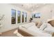 Spacious main bedroom with large windows showcasing city views at 2351 N Emerson St, Denver, CO 80205
