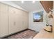 Mudroom includes bench, storage and a window at 2351 N Emerson St, Denver, CO 80205