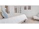 Spacious bedroom with a walk-in closet, bright with a stylish decorative pillow at 8711 E Hampden Ave # 22, Denver, CO 80231