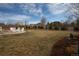 Spacious backyard with a patio area and seating, great for outdoor gatherings and relaxation at 3392 Homestead Dr, Longmont, CO 80504