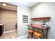 Functional laundry room with a table, hooks and sink area for added convenience at 3392 Homestead Dr, Longmont, CO 80504
