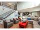 Spacious living room open to the kitchen, stairs and second floor at 3392 Homestead Dr, Longmont, CO 80504