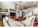 Comfortable living room featuring a fireplace and staircase to the second floor at 3392 Homestead Dr, Longmont, CO 80504