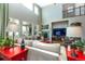 Bright living room boasting high ceilings, large windows and fireplace at 3392 Homestead Dr, Longmont, CO 80504