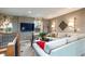 Cozy living room with comfortable sofa, large screen TV, and stylish decor at 3392 Homestead Dr, Longmont, CO 80504