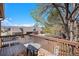 Enjoy the view from this outdoor wood deck with seating and an area for entertaining at 2812 W Davies Dr, Littleton, CO 80120