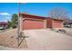 Townhome featuring a one car garage, well-maintained landscaping at 2812 W Davies Dr, Littleton, CO 80120