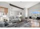 Cozy living room with stylish decor and lots of natural light at 2812 W Davies Dr, Littleton, CO 80120