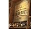 Rustic winery display with wooden sign, award-winning wines, and cozy, inviting ambiance at 2812 W Davies Dr, Littleton, CO 80120