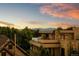 Modern home featuring a roof deck with mountain views and stone accents at 203 Garfield St, Denver, CO 80206
