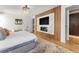 Stylish main bedroom with decorative wood and marble accent wall, modern lighting, and a comfortable bed at 203 Garfield St, Denver, CO 80206