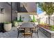 Inviting outdoor dining area with view of well kept garden at 203 Garfield St, Denver, CO 80206