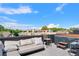 A rooftop deck showcases comfortable seating, a hot tub, and stunning views, creating an ideal outdoor retreat at 203 Garfield St, Denver, CO 80206