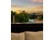 Rooftop view featuring contemporary architecture, lush greenery, and mountains in the distance, creating an inviting outdoor space at 203 Garfield St, Denver, CO 80206