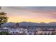 Scenic city view with mountains in the background on a beautiful day during sunset in Denver, Colorado at 2721 Curtis St, Denver, CO 80205