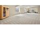Spacious basement featuring an exercise area, a sauna, and carpet flooring at 2258 Front Range Rd, Erie, CO 80516