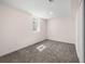 Bedroom featuring neutral carpet and a window allowing light at 7870 Magnolia St, Commerce City, CO 80022