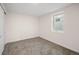 Bedroom with neutral carpet and a window allowing light at 7870 Magnolia St, Commerce City, CO 80022