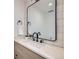 Bathroom with white countertops, modern sink, and black hardware at 372 S Humboldt St, Denver, CO 80209