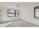 Bright bedroom featuring large windows and plush carpeting at 372 S Humboldt St, Denver, CO 80209