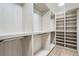 Spacious walk-in closet with custom shelving and ample storage space at 372 S Humboldt St, Denver, CO 80209