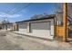 Three car garage with modern doors and private access at 372 S Humboldt St, Denver, CO 80209