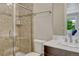 Elegant bathroom featuring a glass enclosed shower and sleek vanity at 9343 Vista Hill Ln, Lone Tree, CO 80124