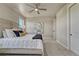 Spacious bedroom featuring a large, comfortable bed and modern decor at 9343 Vista Hill Ln, Lone Tree, CO 80124