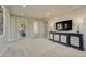 Second-floor bonus room featuring plush carpeting, custom cabinet and sliding glass doors at 9343 Vista Hill Ln, Lone Tree, CO 80124