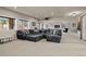 Finished basement Gathering room featuring a projector, oversized seating and a recreational area at 9343 Vista Hill Ln, Lone Tree, CO 80124
