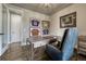 Bright office with hardwood floors, neutral walls, and ample desk space at 9343 Vista Hill Ln, Lone Tree, CO 80124