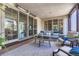 Cozy outdoor living space with comfortable seating, stylish decor, and seamless indoor-outdoor flow at 9343 Vista Hill Ln, Lone Tree, CO 80124
