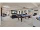 Large basement recreation room with a pool table and entertainment area for gatherings at 9343 Vista Hill Ln, Lone Tree, CO 80124