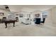 Basement rec room with pool table, seating, TV, and lots of space for entertaining at 9343 Vista Hill Ln, Lone Tree, CO 80124
