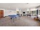 Recreational basement with a ping pong table, billiards table, and comfortable seating area at 367 Sandy Hollow Trl, Franktown, CO 80116