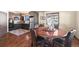 Eat-in kitchen with stainless steel appliances and wood-style flooring at 367 Sandy Hollow Trl, Franktown, CO 80116