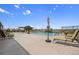 Relax in style by the community pool with comfortable loungers and scenic views, perfect for soaking up the sun at 15788 Xanthia Way, Thornton, CO 80602