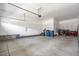 Spacious two-car garage with ample storage space and a clean, organized layout at 15788 Xanthia Way, Thornton, CO 80602
